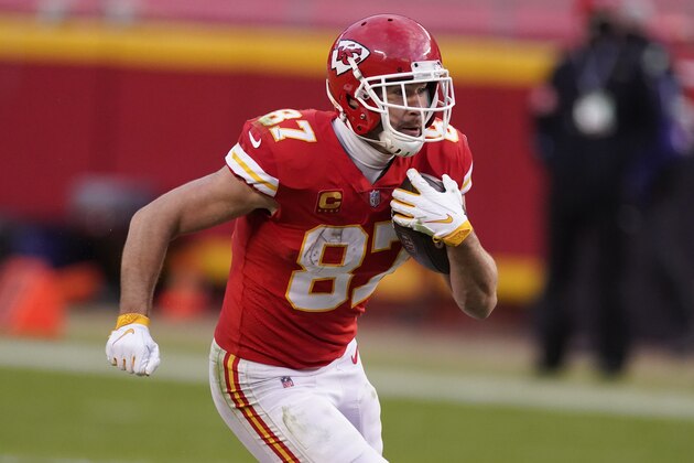 Kansas City Chiefs tight end Travis Kelce runs up field after catching a pass during the second half of an NFL divisional round football game against the Cleveland Browns, Sunday, Jan. 17, 2021, in Kansas City. (AP Photo/Charlie Riedel)