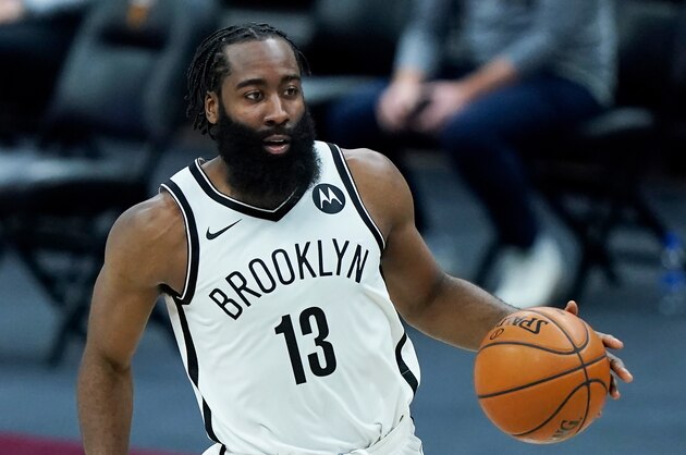 Brooklyn Nets' James Harden drives against the Cleveland Cavaliers during the second half of an NBA basketball game, Wednesday, Jan. 20, 2021, in Cleveland. (AP Photo/Tony Dejak)