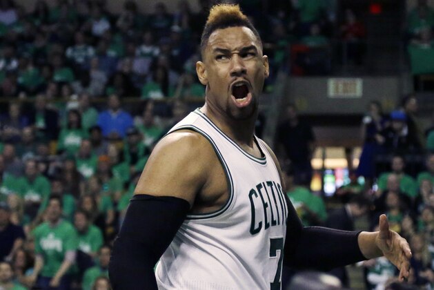 Boston Celtics center Jared Sullinger yells after being fouled by Atlanta Hawks forward Kent Bazemore during the third quarter in Game 3 of a first-round NBA basketball playoff series Friday, April 22, 2016, in Boston. The Celtics won 111-103. (AP Photo/Elise Amendola)