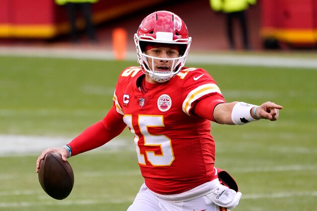 Kansas City Chiefs quarterback Patrick Mahomes looks for a receiver during the second half of an NFL divisional round football game against the Cleveland Browns Sunday, Jan. 17, 2021, in Kansas City, Mo. (AP Photo/Charlie Riedel)