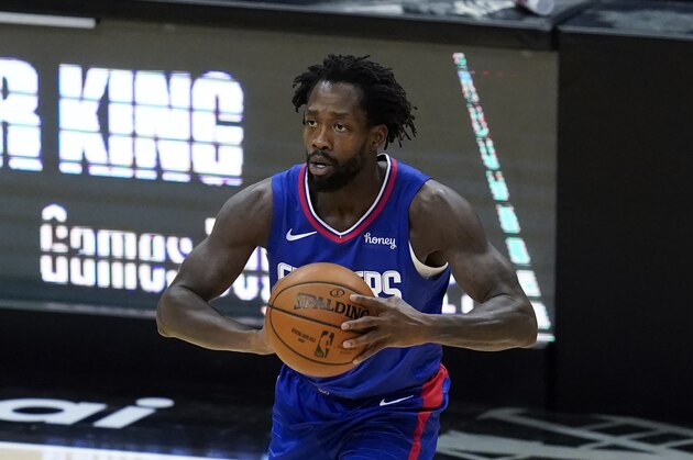 Los Angeles Clippers guard Patrick Beverley passes the ball during the first half of an NBA basketball game against the New Orleans Pelicans Wednesday, Jan. 13, 2021, in Los Angeles. (AP Photo/Ashley Landis)