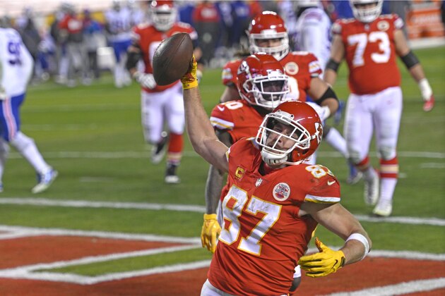Kansas City Chiefs tight end Travis Kelce celebrates after catching a 5-yard touchdown pass during the second half of the AFC championship NFL football game against the Buffalo Bills, Sunday, Jan. 24, 2021, in Kansas City, Mo. (AP Photo/Reed Hoffmann)