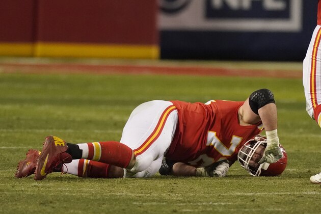 Kansas City Chiefs offensive tackle Eric Fisher reacts after getting injured during the second half of the AFC championship NFL football game against the Buffalo Bills, Sunday, Jan. 24, 2021, in Kansas City, Mo. (AP Photo/Charlie Riedel)