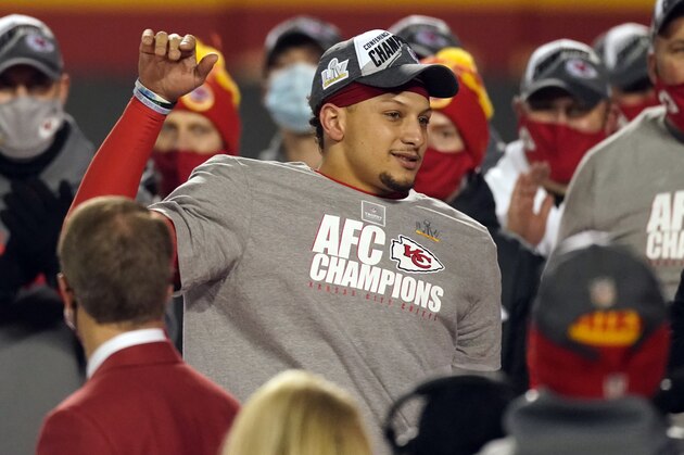 Kansas City Chiefs quarterback Patrick Mahomes celebrates with teammates after the AFC championship NFL football game against the Buffalo Bills, Sunday, Jan. 24, 2021, in Kansas City, Mo. The Chiefs won 38-24. (AP Photo/Charlie Riedel)