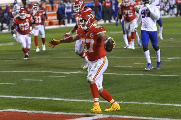 Kansas City Chiefs tight end Travis Kelce celebrates after catching a 5-yard touchdown pass during the second half of the AFC championship NFL football game against the Buffalo Bills, Sunday, Jan. 24, 2021, in Kansas City, Mo. (AP Photo/Reed Hoffmann)