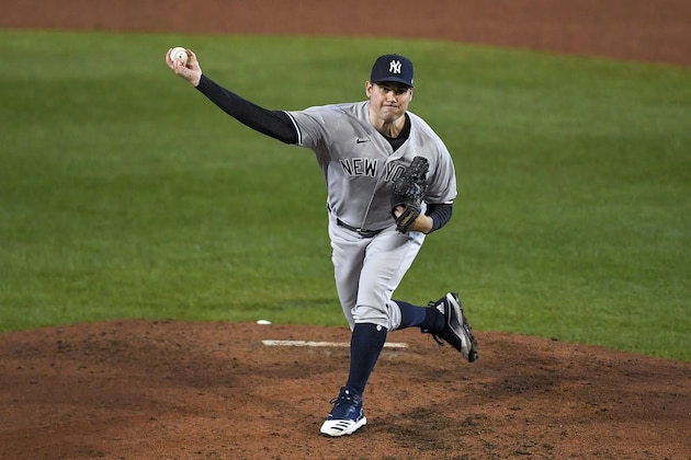 New York Yankees pitcher Adam Ottavino throws to a Toronto Blue Jays batter during the sixth inning of a baseball game in Buffalo, N.Y., Thursday, Sept. 24, 2020. (AP Photo/Adrian Kraus)
