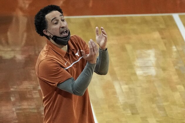Texas head coach Shaka Smart directs his team during the second half of an NCAA college basketball game against Kansas State in Austin, Texas, Saturday, Jan. 16, 2021. (AP Photo/Chuck Burton)