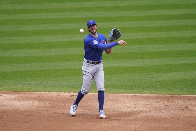 Chicago Cubs third baseman Kris Bryant throws out Chicago White Sox's Nick Madrigal at first during the third inning of a baseball game in Chicago, Sunday, Sept. 27, 2020. (AP Photo/Nam Y. Huh)