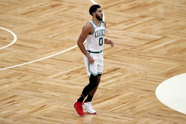 Boston Celtics' Jayson Tatum plays against the Memphis Grizzlies during the first half of an NBA basketball game, Wednesday, Dec. 30, 2020, in Boston. (AP Photo/Michael Dwyer)