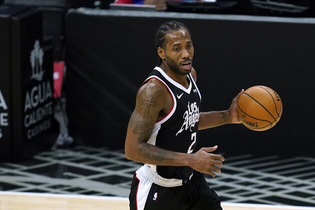 Los Angeles Clippers forward Kawhi Leonard (2) controls the ball during the third quarter of an NBA basketball game against the Indiana Pacers Sunday, Jan. 17, 2021, in Los Angeles. (AP Photo/Ashley Landis)