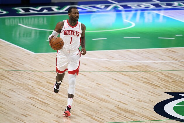 Houston Rockets guard John Wall advances the ball up court against the Dallas Mavericks during an NBA basketball game in Dallas, Saturday, Jan. 23, 2021. (AP Photo/Tony Gutierrez)
