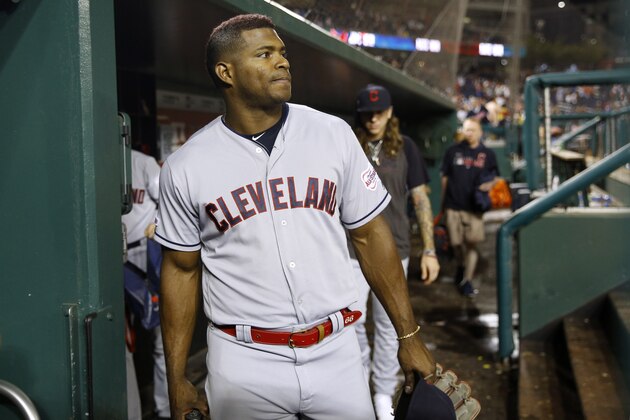 FILE - In this Friday, Sept. 27, 2019, file photo, Cleveland Indians' Yasiel Puig walks out of the dugout after a baseball game against the Washington Nationals, in Washington. For the first time since 2015, baseball’s postseason will go on without the Indians. (AP Photo/Patrick Semansky, File)