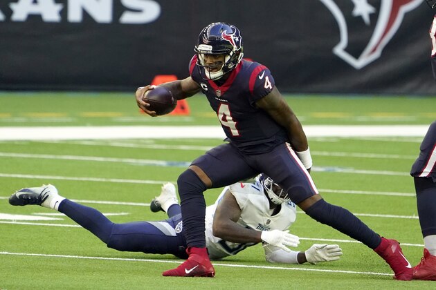 Houston Texans quarterback Deshaun Watson (4) scrambles away from Tennessee Titans linebacker David Long Jr. during the first half of an NFL football game Sunday, Jan. 3, 2021, in Houston. (AP Photo/Eric Christian Smith)