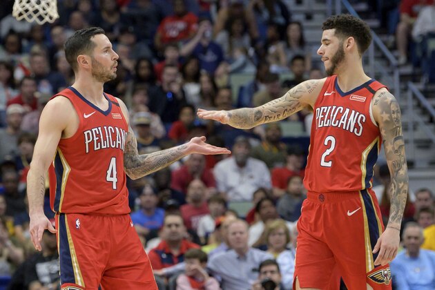 New Orleans Pelicans guard JJ Redick (4) and guard Lonzo Ball (2) celebrate a score against the Los Angeles Clippers in the first half an NBA basketball game in New Orleans, Saturday, Jan. 18, 2020. (AP Photo/Matthew Hinton)
