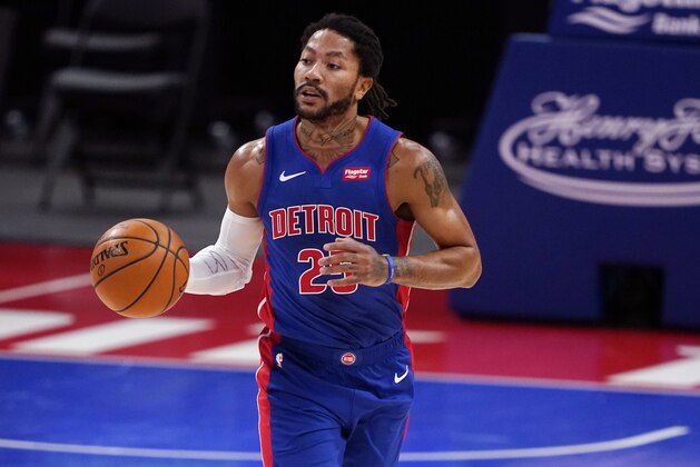 Detroit Pistons guard Derrick Rose brings the ball up court during the first half of an NBA basketball game against the Houston Rockets, Friday, Jan. 22, 2021, in Detroit. (AP Photo/Carlos Osorio) Detroit Pistons guard Derrick Rose brings the ball up court during the first half of an NBA basketball game against the Houston Rockets, Friday, Jan. 22, 2021, in Detroit. (AP Photo/Carlos Osorio)