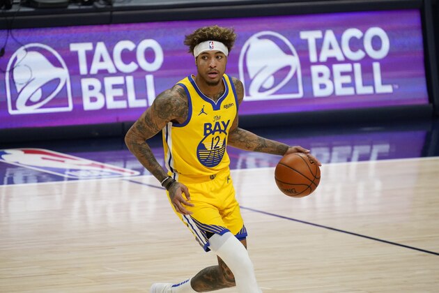 Golden State Warriors guard Kelly Oubre Jr. (12) in the second half of an NBA basketball game late Thursday, Jan. 14, 2021, in Denver. (AP Photo/David Zalubowski)