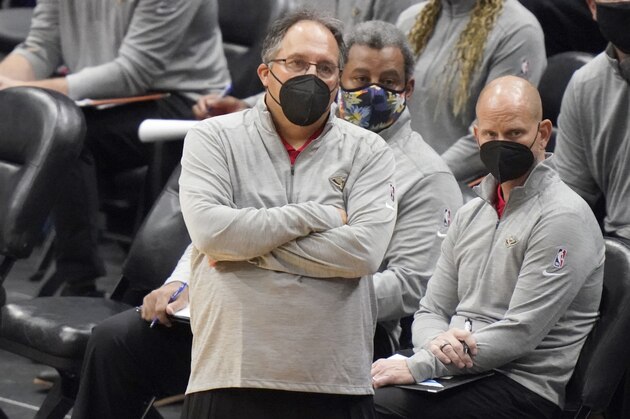 New Orleans Pelicans head coach Stan Van Gundy walks along the bench in the second half of an NBA preseason basketball game against the Milwaukee Bucks in New Orleans, Friday, Dec. 18, 2020. (AP Photo/Gerald Herbert)