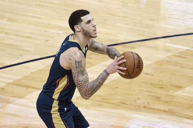 New Orleans Pelicans guard Lonzo Ball (2) shoots a free throw against the Oklahoma City Thunder in the fourth quarter of an NBA basketball game in New Orleans, Wednesday, Jan. 6, 2021. (AP Photo/Derick Hingle) New Orleans Pelicans guard Lonzo Ball (2) shoots a free throw against the Oklahoma City Thunder in the fourth quarter of an NBA basketball game in New Orleans, Wednesday, Jan. 6, 2021. (AP Photo/Derick Hingle)