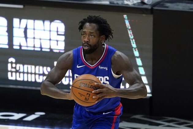 Los Angeles Clippers guard Patrick Beverley passes the ball during the first half of an NBA basketball game against the New Orleans Pelicans Wednesday, Jan. 13, 2021, in Los Angeles. (AP Photo/Ashley Landis)