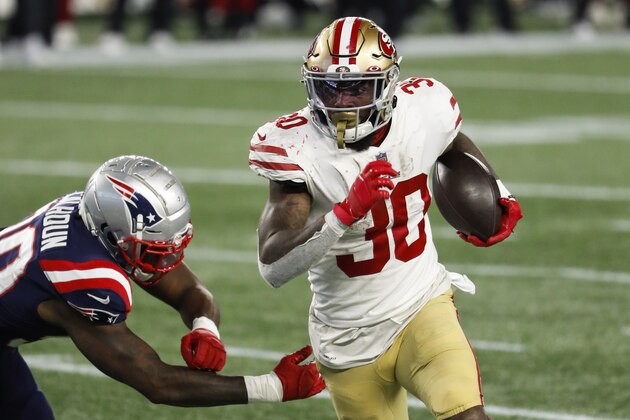 San Francisco 49ers running back Jeff Wilson Jr. runs against the New England Patriots during an NFL football game at Gillette Stadium, Sunday, Oct. 25, 2020 in Foxborough, Mass. (Winslow Townson/AP Images for Panini)