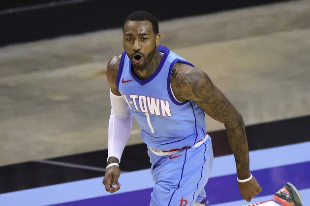 Houston Rockets' John Wall reacts during the second quarter against the Washington Wizards in an NBA basketball game Tuesday, Jan. 26, 2021, in Houston. (Carmen Mandato/Pool Photo via AP)