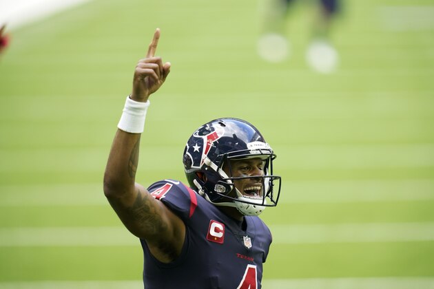 Houston Texans quarterback Deshaun Watson (4) smiles as he celebrates a touchdown as he points skyward with his index finger during an NFL football game against the Cincinnati Bengals, Sunday, Dec. 27, 2020, in Houston. (AP Photo/Matt Patterson)