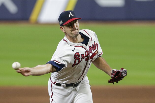 Atlanta Braves' Darren O'Day delivers a pitch during the sixth inning in Game 2 of a baseball National League Division Series against the Miami Marlins Wednesday, Oct. 7, 2020, in Houston. (AP Photo/Michael Wyke)
