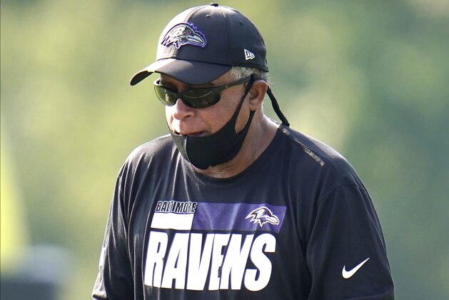 Baltimore Ravens assistant head coach David Culley works with wide receivers during an NFL football training camp practice, Tuesday, Aug. 25, 2020, in Owings Mills, Md. (AP Photo/Julio Cortez)