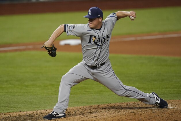 Tampa Bay Rays relief pitcher Aaron Loup throws against the Los Angeles Dodgers during the eighth inning in Game 2 of the baseball World Series Wednesday, Oct. 21, 2020, in Arlington, Texas. (AP Photo/Eric Gay)