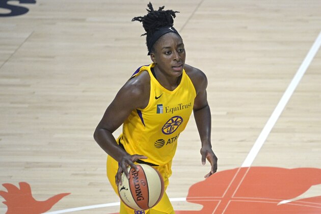 Los Angeles Sparks forward Nneka Ogwumike sets up a play during the second half of a WNBA basketball game against the Washington Mystics, Thursday, Sept. 10, 2020, in Bradenton, Fla. (AP Photo/Phelan M. Ebenhack)