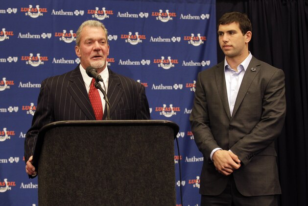 Indianapolis Colts owner Jim Irsay, left, introduces quarterback Andrew Luck, the first pick of the NFL football draft by the Colts, in Indianapolis, Friday, April 27, 2012. (AP Photo/Michael Conroy)