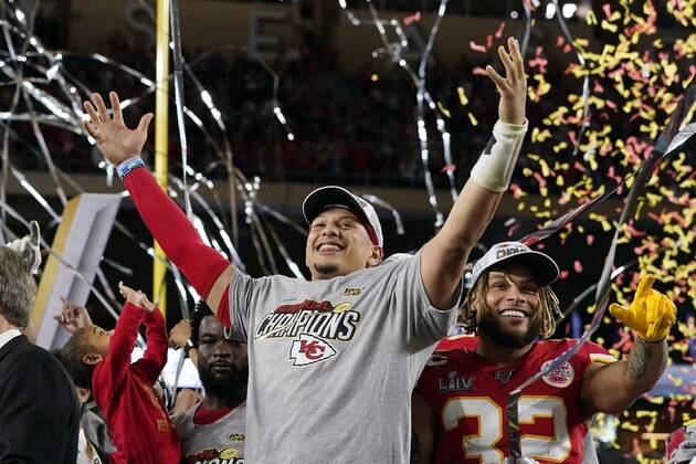 FILE - In this Feb. 2, 2020, file photo, Kansas City Chiefs' Patrick Mahomes, left, and Tyrann Mathieu celebrate after defeating the San Francisco 49ers in the NFL Super Bowl 54 football game in Miami Gardens, Fla. After leading the Chiefs to their first Super Bowl championship in five decades, Mahomes is finally eligible to sign a contract extension this off-season. Both sides are eager to come to terms on what could be a record-setting deal. (AP Photo/David J. Phillip, File)