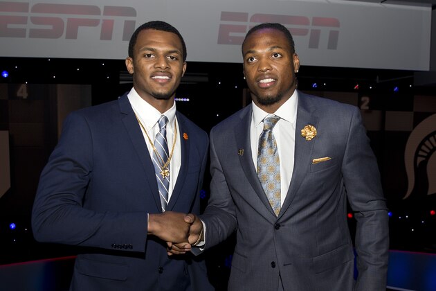 Heisman Trophy candidates Clemson quarterback Deshaun Watson, left, and Alabama running back Derrick Henry pose for a photograph after the college football awards at the College Football Hall of Fame, Thursday, Dec. 10, 2015, in Atlanta. (AP Photo/John Bazemore)