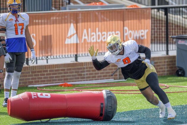 National Team defensive lineman Daelin Hayes of Notre Dame (9) runs drill during the National Team practice for the NCAA Senior Bowl college football game in Mobile, Ala. Wednesday, Jan. 27, 2021. (AP Photo/Matthew Hinton)
