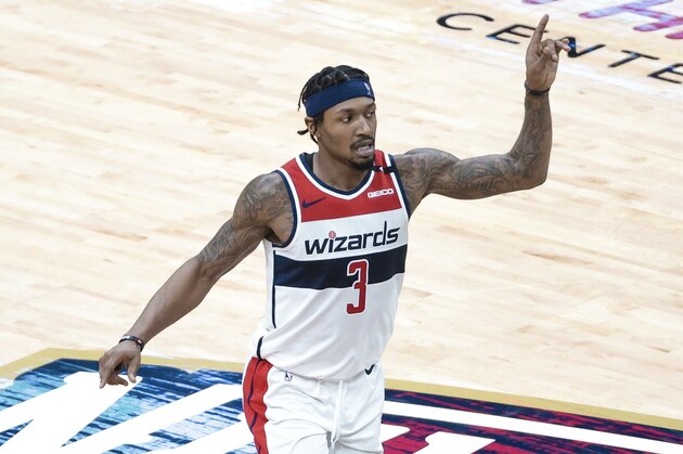 Washington Wizards guard Bradley Beal (3) reacts after a score against the New Orleans Pelicans in the fourth quarter of an NBA basketball game in New Orleans, Wednesday, Jan. 27, 2021. (AP Photo/Derick Hingle)