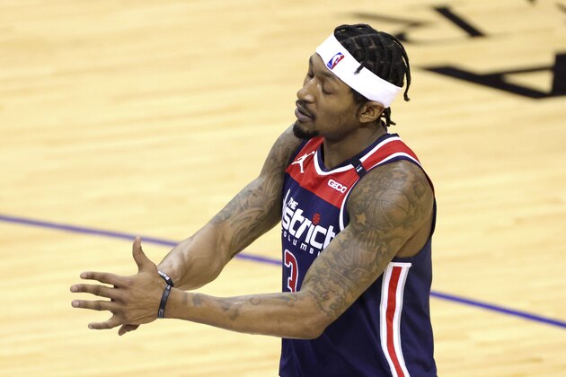 Washington Wizards' Bradley Beal reacts to a call during the fourth quarter of the team's NBA basketball game against the Houston Rockets on Tuesday, Jan. 26, 2021, in Houston. (Carmen Mandato/Pool Photo via AP)