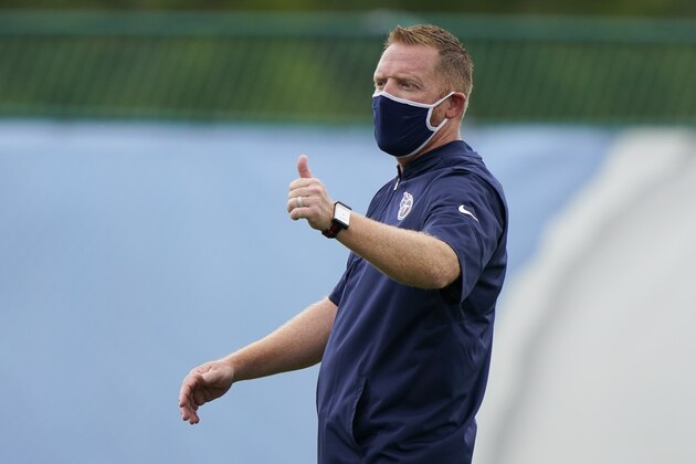 Tennessee Titans tight ends coach Todd Downing watches a drill during NFL football training camp Friday, Aug. 28, 2020, in Nashville, Tenn. (AP Photo/Mark Humphrey, Pool)