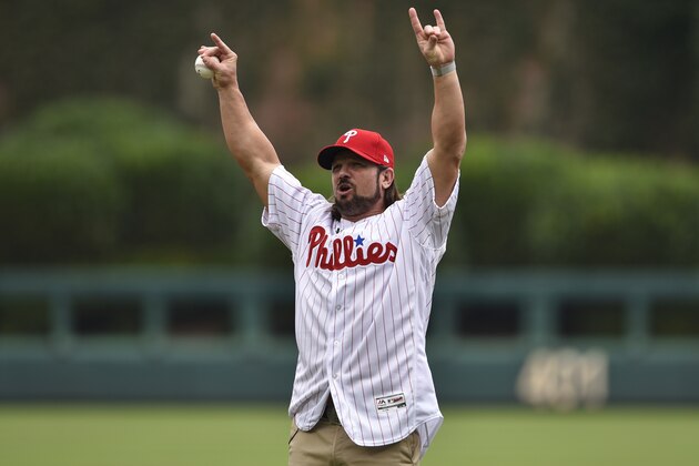 WWE superstar A.J. Styles throws out the ceremonial opening pitch prior to a baseball game between the Philadelphia Phillies and the Milwaukee Brewers, Sunday, July 23, 2017, in Philadelphia. (AP Photo/Derik Hamilton)