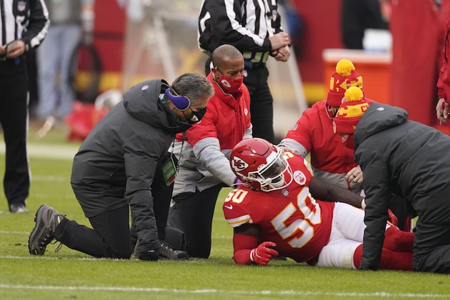 Kansas City Chiefs linebacker Willie Gay is helped off the field after getting injured during the first half of an NFL football game against the Los Angeles Chargers, Sunday, Jan. 3, 2021, in Kansas City. (AP Photo/Charlie Riedel)