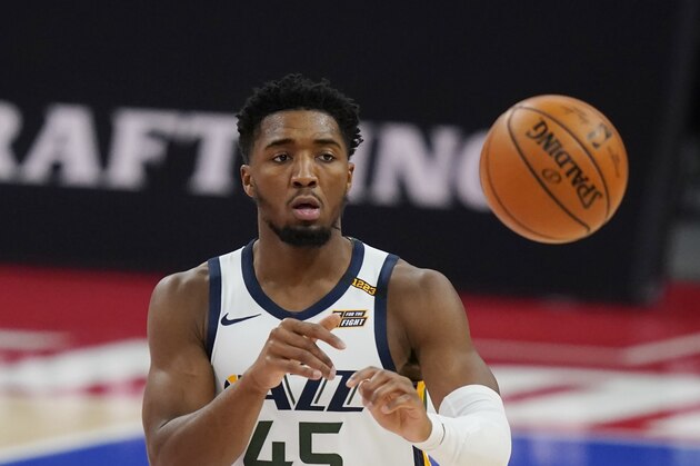 Utah Jazz guard Donovan Mitchell plays during the first half of an NBA basketball game, Sunday, Jan. 10, 2021, in Detroit. (AP Photo/Carlos Osorio)