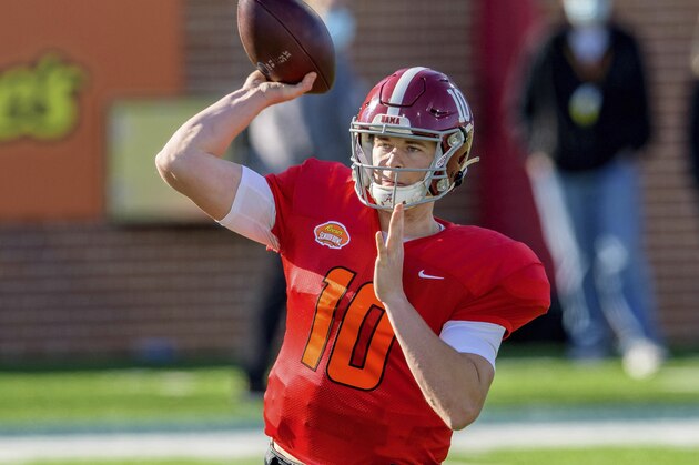 American Team quarterback Mac Jones of Alabama (10) throws during the American Team practice for the NCAA Senior Bowl college football game in Mobile, Ala., Thursday, Jan. 28, 2021. (AP Photo/Matthew Hinton)