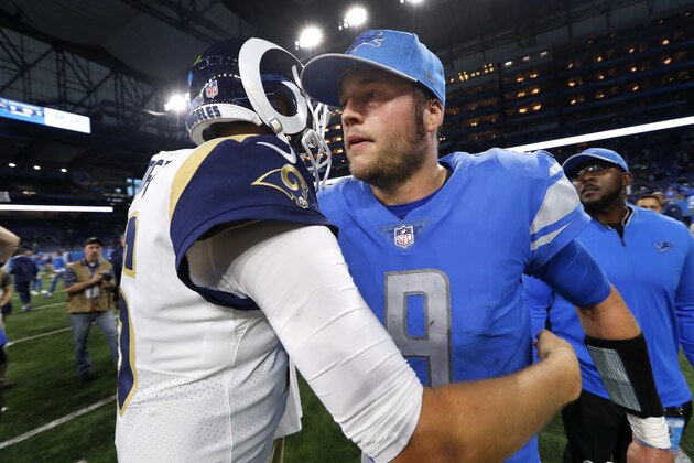 Detroit Lions quarterback Matthew Stafford (9) talks with Los Angeles Rams quarterback Jared Goff after an NFL football game in Detroit, Sunday, Dec. 2, 2018. (AP Photo/Paul Sancya)