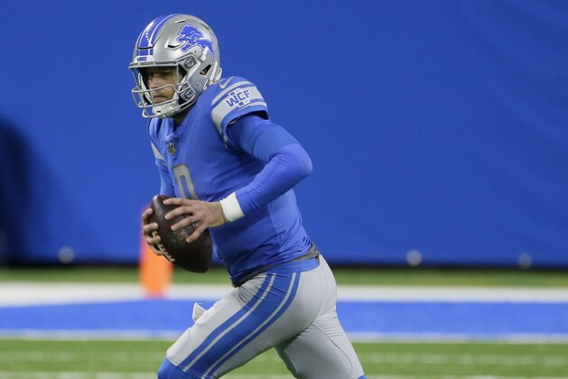 Detroit Lions quarterback Matthew Stafford scrambles during the first half of an NFL football game against the Minnesota Vikings, Sunday, Jan. 3, 2021, in Detroit. (AP Photo/Duane Burleson)