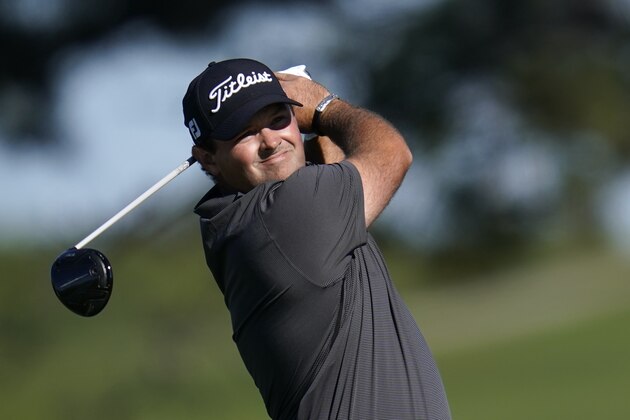 Patrick Reed hits his tee shot on the fifth hole of the South Course during the third round of the Farmers Insurance Open golf tournament at Torrey Pines, Saturday, Jan. 30, 2021, in San Diego. (AP Photo/Gregory Bull)