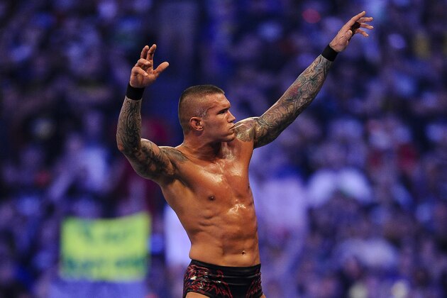 FILE- In this Sunday, April 3, 2011 file photo, WWE Superstar Randy Orton celebrates defeating CM Punk (not pictured) during WrestleMania XXVII at the Georgia Dome in Atlanta, Georgia on. World-famous WWE wrestlers such as John Cena, Shaemus and champion Randy Orton are in Saudi Arabia for three days of matches in the capital Riyadh. (Paul Abell/AP Images for WWE, File)