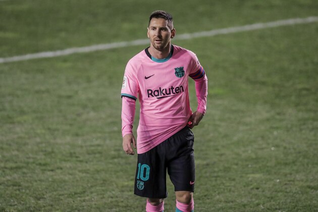 Barcelona's Lionel Messi during a Spanish Copa del Rey round of 16 soccer match between Rayo Vallecano and FC Barcelona at the Vallecas stadium in Madrid, Spain, Wednesday, Jan. 27, 2021. (AP Photo/Manu Fernandez)