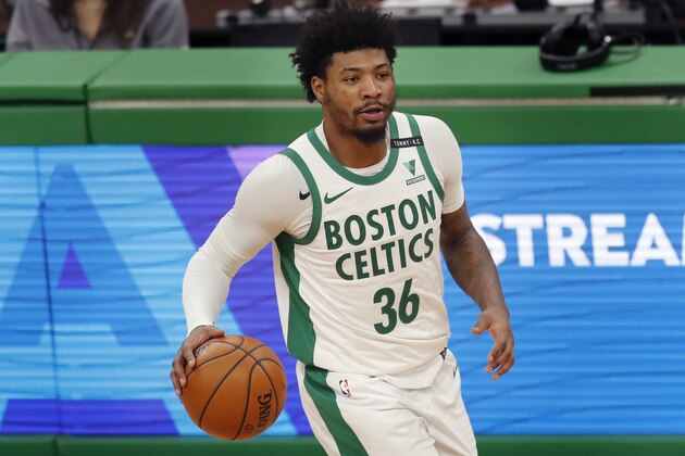 Boston Celtics' Marcus Smart plays against the Los Angeles Lakers during the second half of an NBA basketball game, Saturday, Jan. 30, 2021, in Boston. (AP Photo/Michael Dwyer)