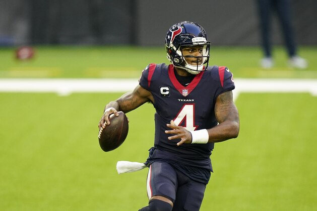 Houston Texans quarterback Deshaun Watson (4) rolls out as he looks to pass during an NFL football game against the Tennessee Titans, Sunday, Jan. 3, 2021, in Houston. (AP Photo/Matt Patterson)