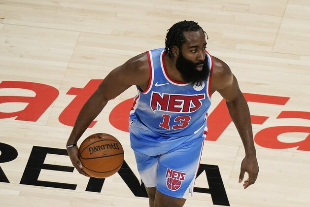 Brooklyn Nets guard James Harden (13) in the first half of an NBA basketball game Wednesday, Jan. 27, 2021, in Atlanta. (AP Photo/Brynn Anderson)