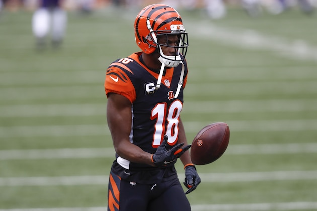 Cincinnati Bengals wide receiver A.J. Green (18) warms up before an NFL football game against the Baltimore Ravens, Sunday, Jan. 3, 2021, in Cincinnati. (AP Photo/Aaron Doster)